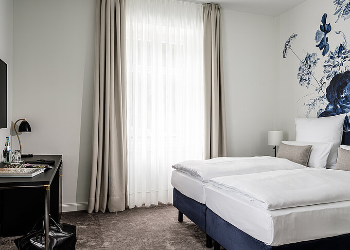 AMERON Neuschwanstein Alpsee Resort & Spa Zimmer Suite Lisl Schlafzimmer